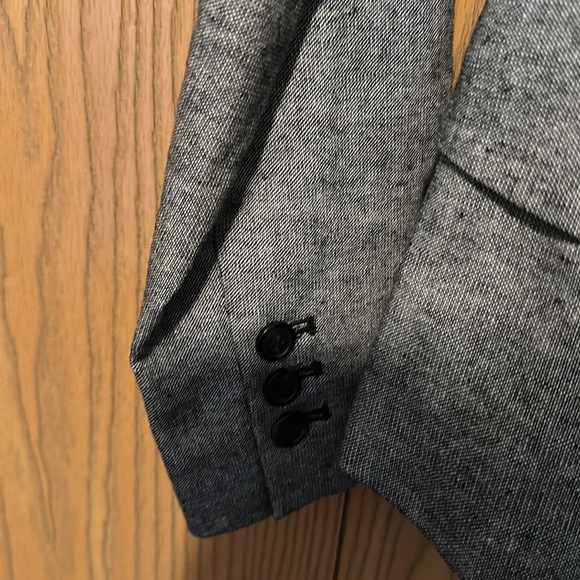 A polish black and white blazer with matching belt and pockets - Picture 3 of 8